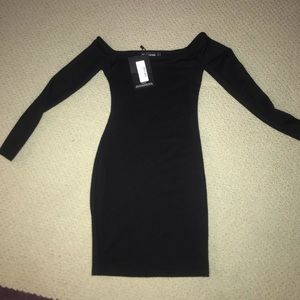 Black bodycon off the shoulder dress